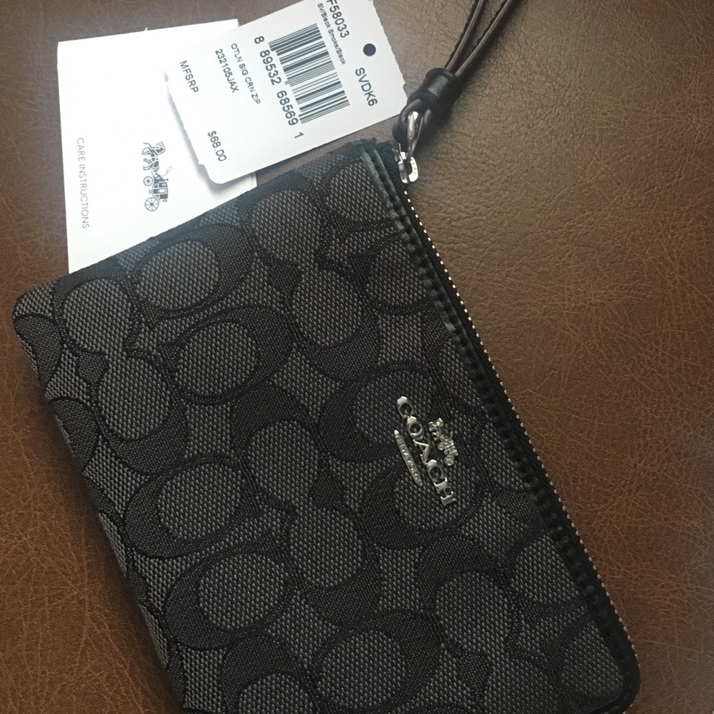 Black signature Coach wristlet